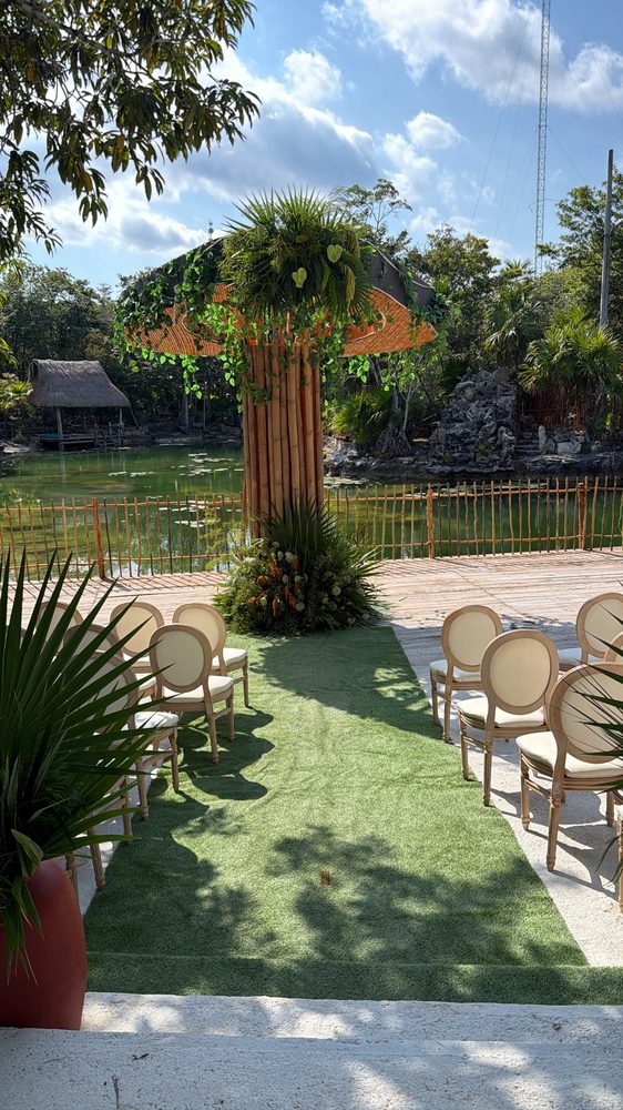 Ceremony setup beside a lagoon at Tulum Wedding Week 2026
